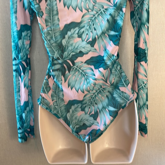 be the center of attention in this stunning sheer/floral print bodysuit - Picture 5 of 7